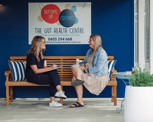 Clients relaxing at the Bottoms Up Colonics reception